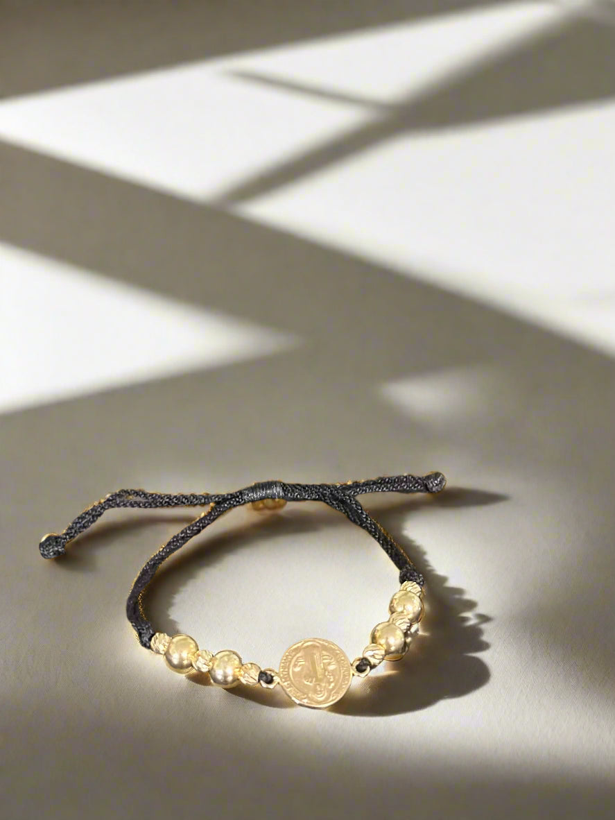 18K Gold Saint Benedict Center Charm Bracelet Black Cord